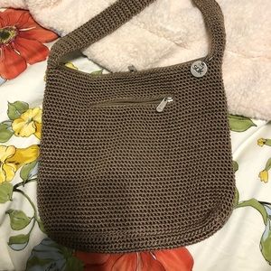 The “Sak” woven purse.  Can hold an iPad. NWOT